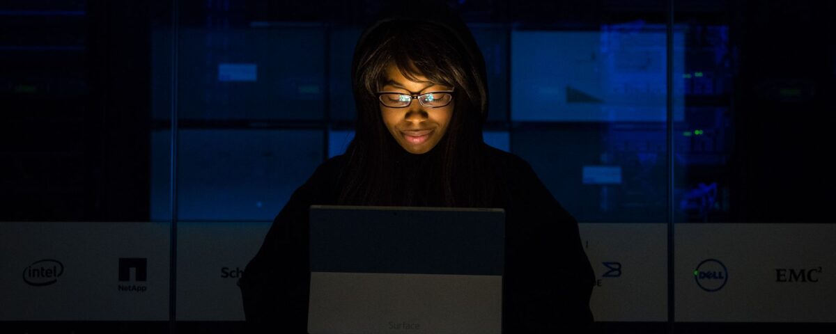 Security technician auditing Active Directory permissions on enterprise server console