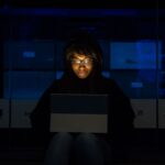 Security technician auditing Active Directory permissions on enterprise server console