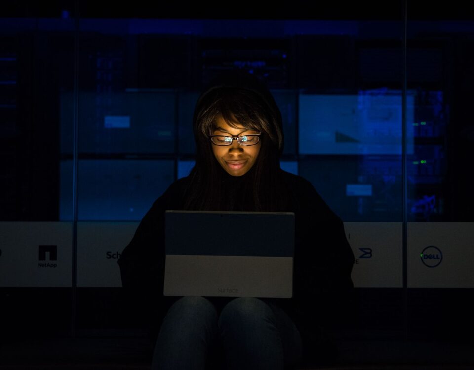 Security technician auditing Active Directory permissions on enterprise server console