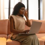 Security analyst reviewing a suspicious AI-generated phishing email on laptop