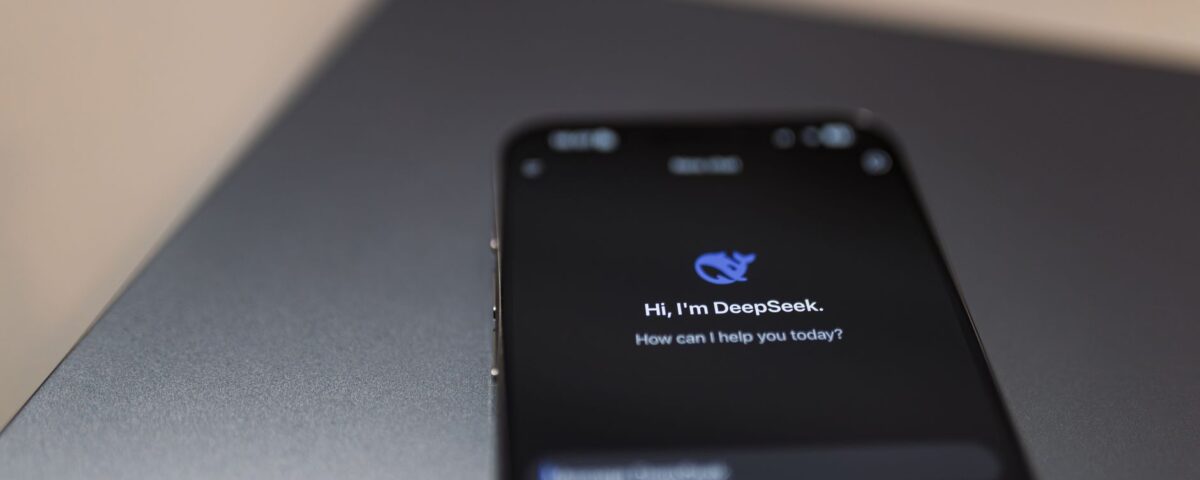 Smartphone displaying AI workflow dashboard in secure enterprise office environment