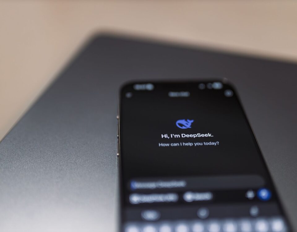 Smartphone displaying AI workflow dashboard in secure enterprise office environment