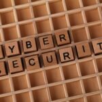 CISO reviewing vulnerability management threat intelligence dashboard in SOC