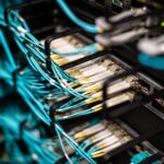 Enterprise server room with red warning lights during a security incident