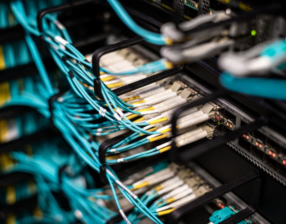 Enterprise server room with red warning lights during a security incident