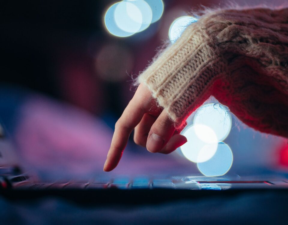 Security researcher analyzing prompt injection attack patterns on laptop screen