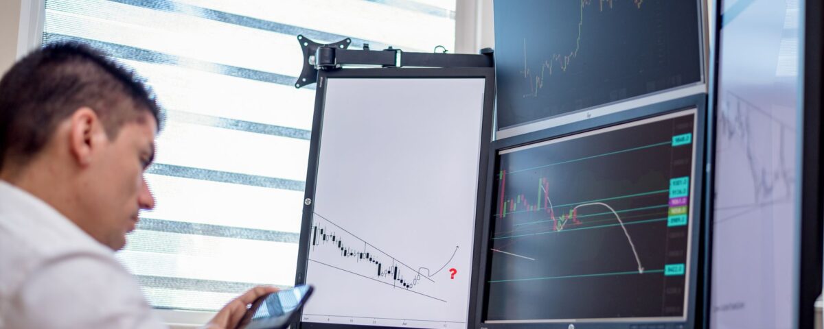 Security analyst monitoring AI threat detection dashboards in operations center