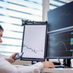 Security analyst monitoring AI threat detection dashboards in operations center