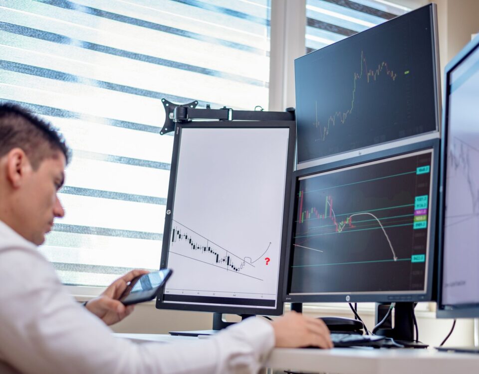 Security analyst monitoring AI threat detection dashboards in operations center