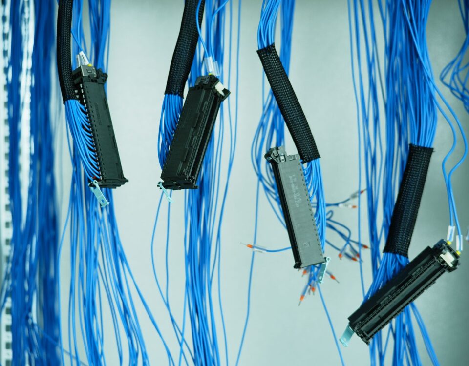 Dense server rack cables and blinking LEDs in enterprise data center