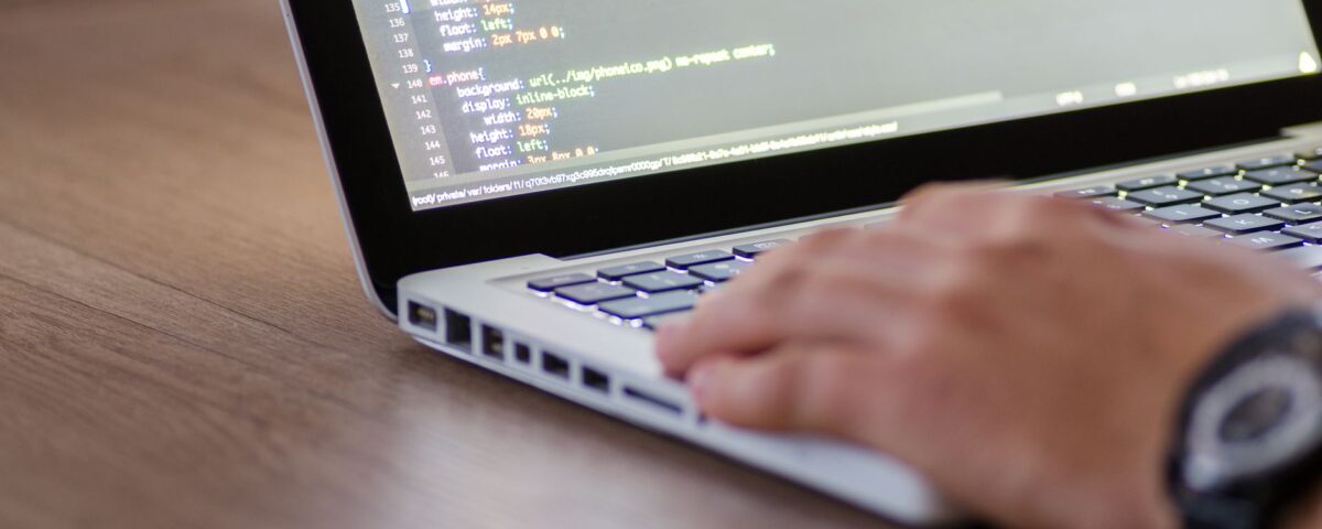 Developer workstation showing Claude API authentication code and security key