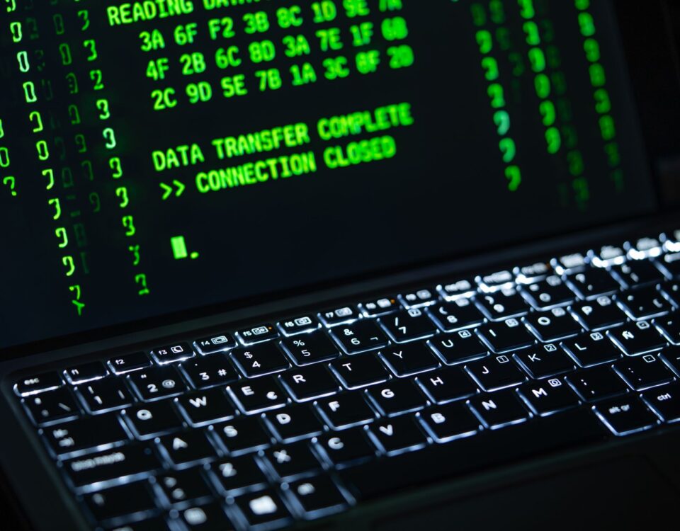 Laptop terminal displaying Gemini API authentication code with security key dongle