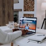 IT professional auditing personal account privacy settings on laptop with hardware security key
