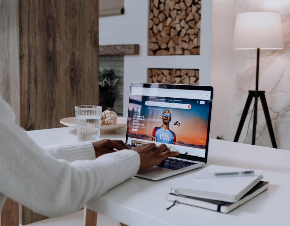 IT professional auditing personal account privacy settings on laptop with hardware security key