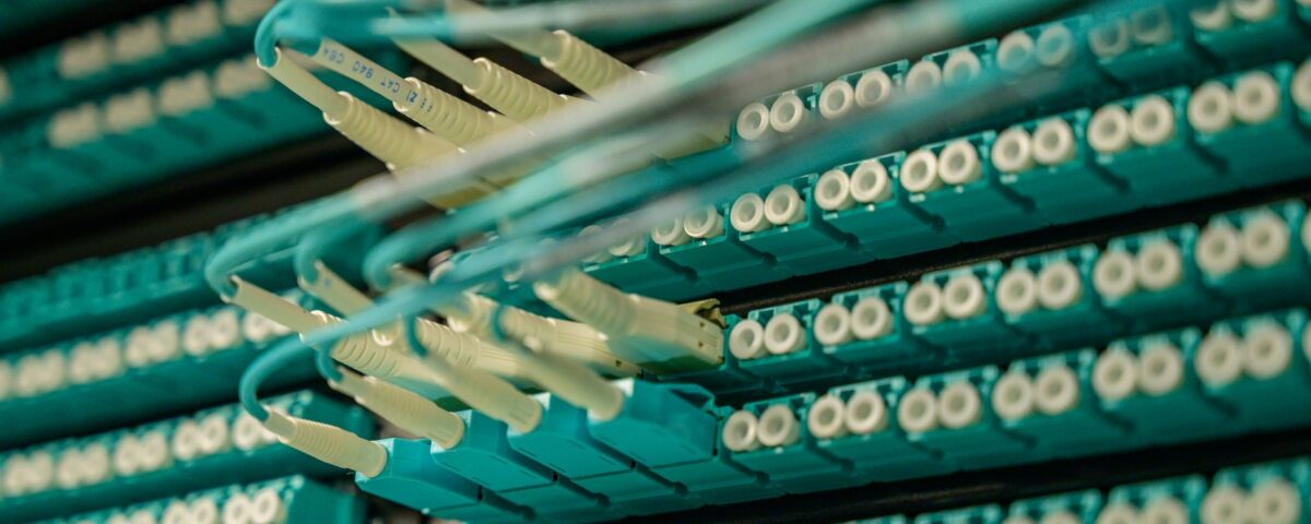 Enterprise server rack with dense cable connections in dark data center