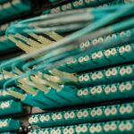 Enterprise server rack with dense cable connections in dark data center