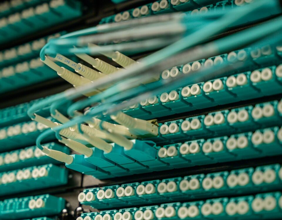 Enterprise server rack with dense cable connections in dark data center