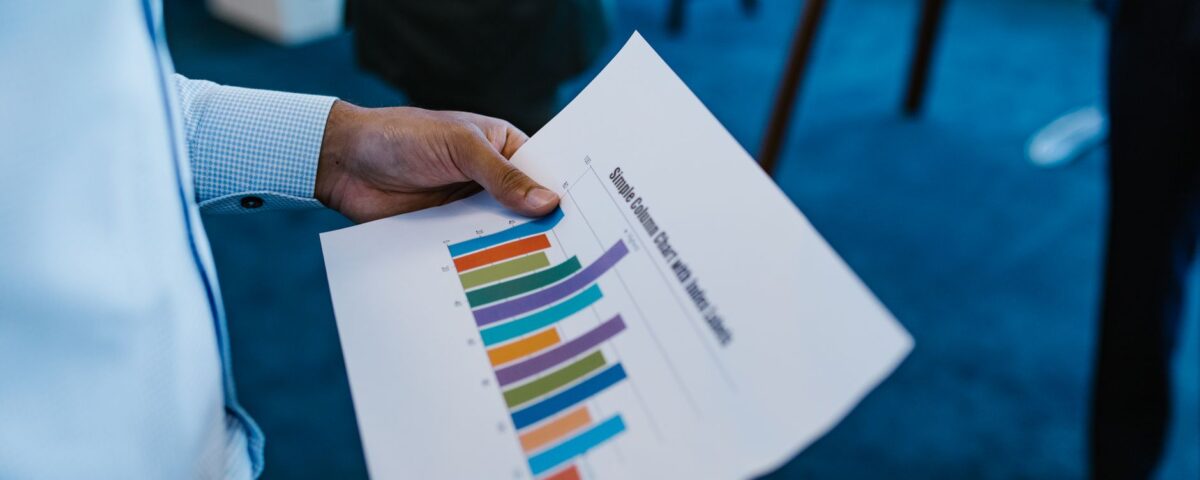 Security analyst reviewing penetration test report findings at desk