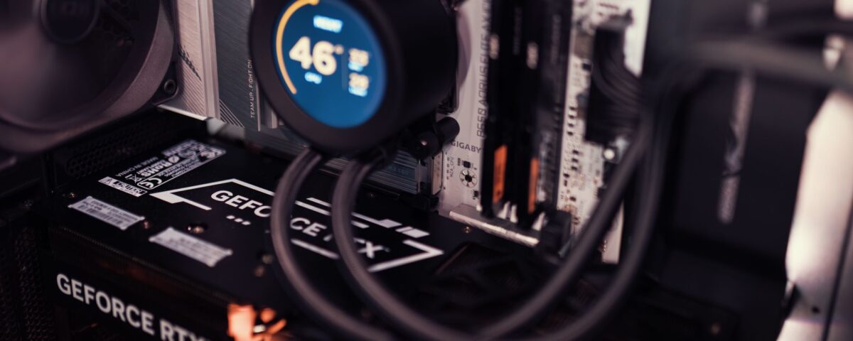 GPU server rack with warning light in dark data center room