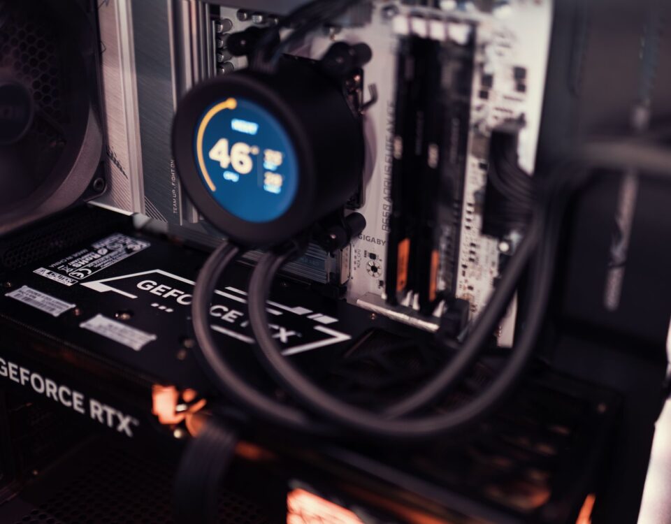 GPU server rack with warning light in dark data center room