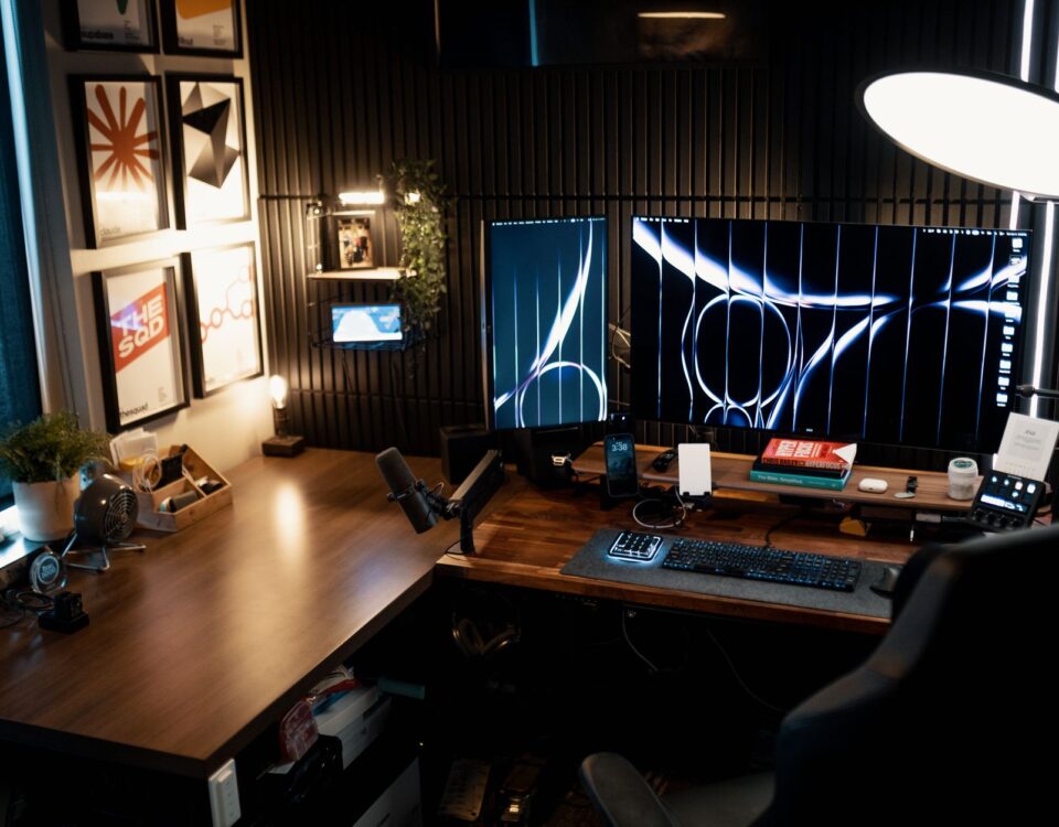 Security analyst reviewing AI agent behavioral baseline dashboards across multiple monitors