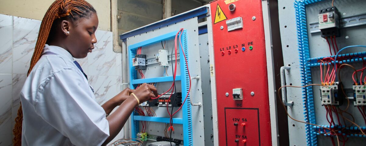 IT engineer monitoring cloud infrastructure security dashboards in server room