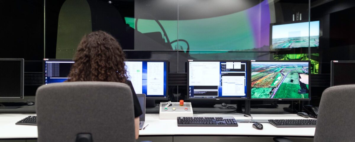 Security analyst reviewing AI agent action approval request on control room monitors