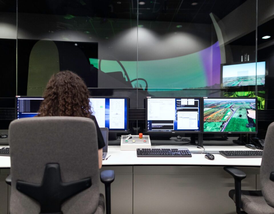 Security analyst reviewing AI agent action approval request on control room monitors