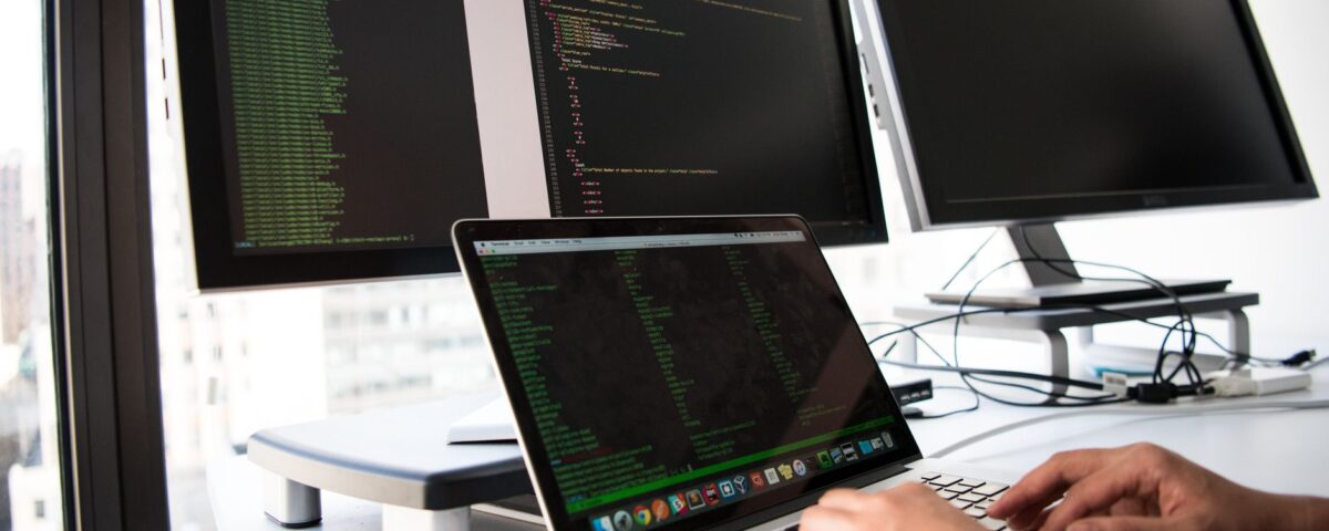 Security professional reviewing OAuth authentication tokens on laptop screen