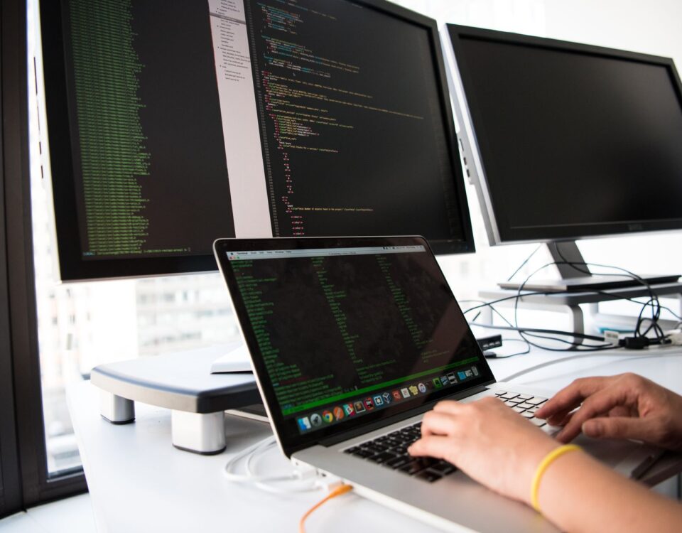 Security professional reviewing OAuth authentication tokens on laptop screen