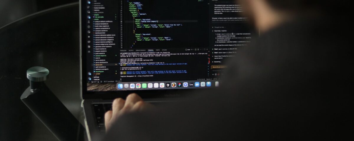 Security engineer reviewing AI plugin code on dual monitors in office