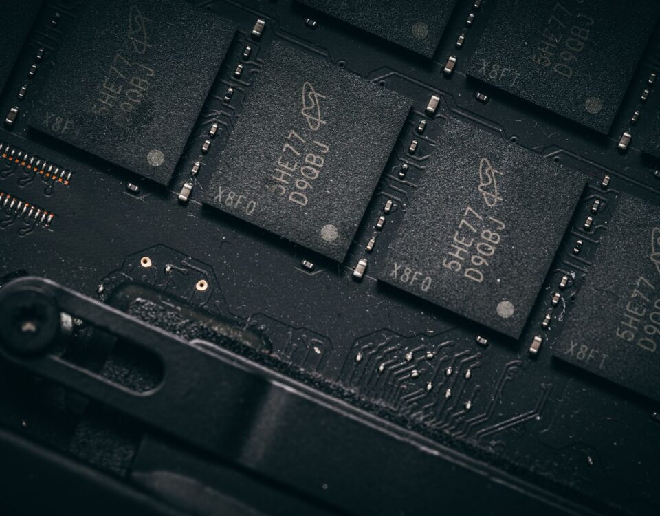 Technician examining UEFI firmware chip on a server motherboard