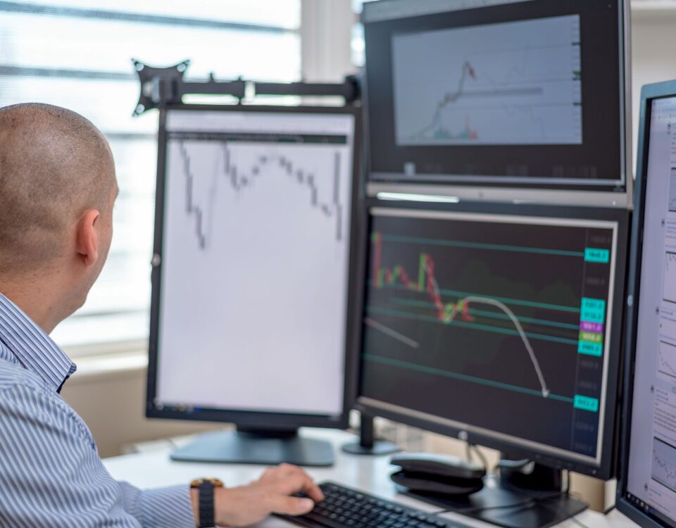 Security analyst monitoring AI-driven network scanning activity across multiple screens