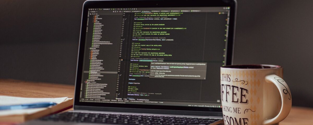 Developer reviewing Docker container security warnings on terminal monitor