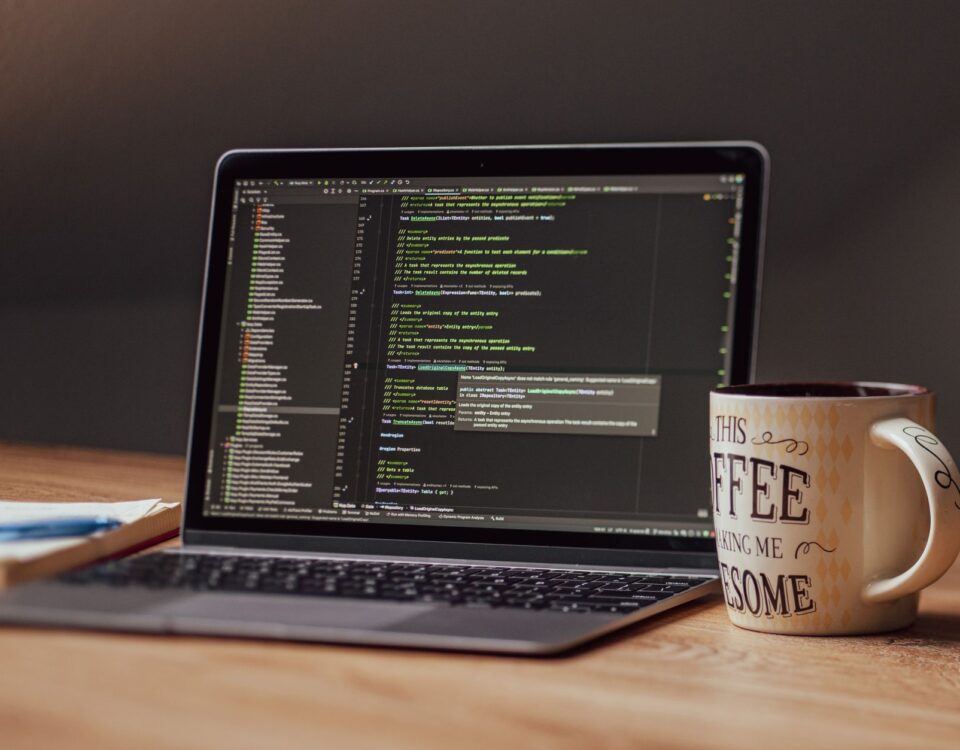 Developer reviewing Docker container security warnings on terminal monitor