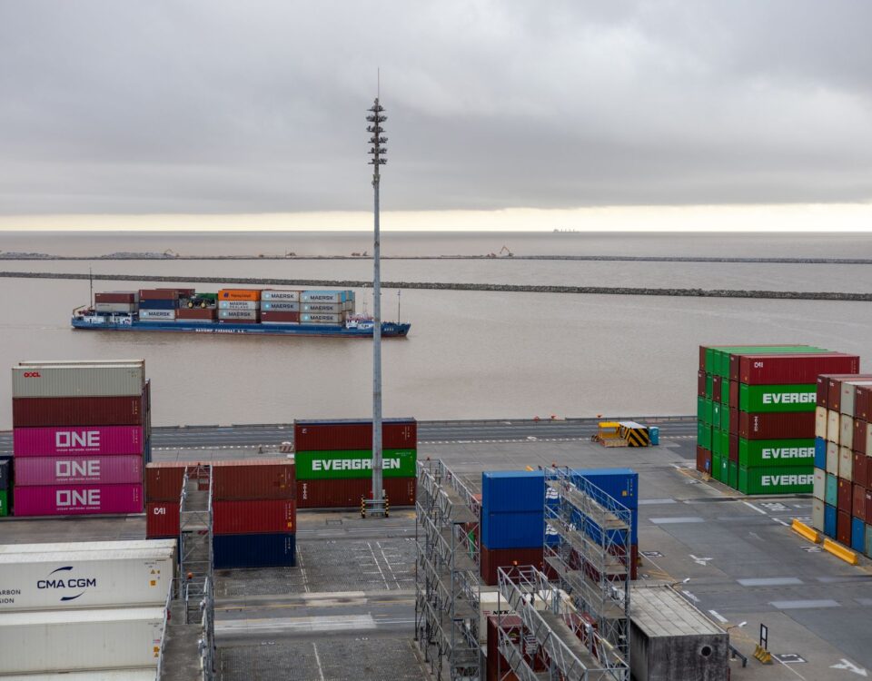 Hardened shipping container with padlock representing secured Docker container image