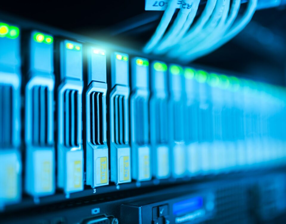 Enterprise data center server rack aisle with color-coded cable bundles