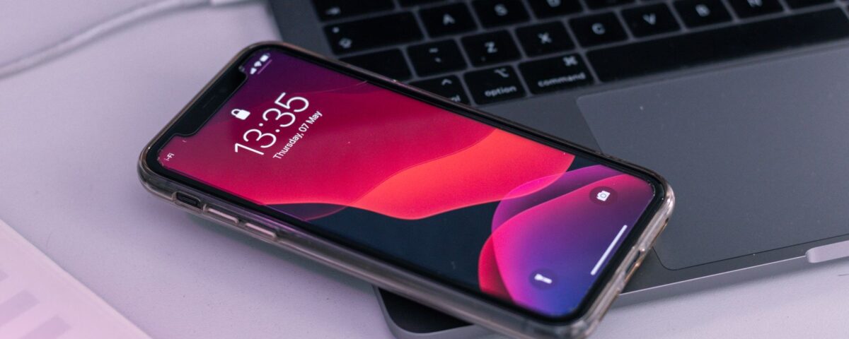Smartphone lying untouched on a corporate conference table in boardroom