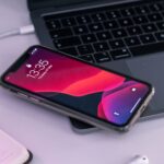 Smartphone lying untouched on a corporate conference table in boardroom