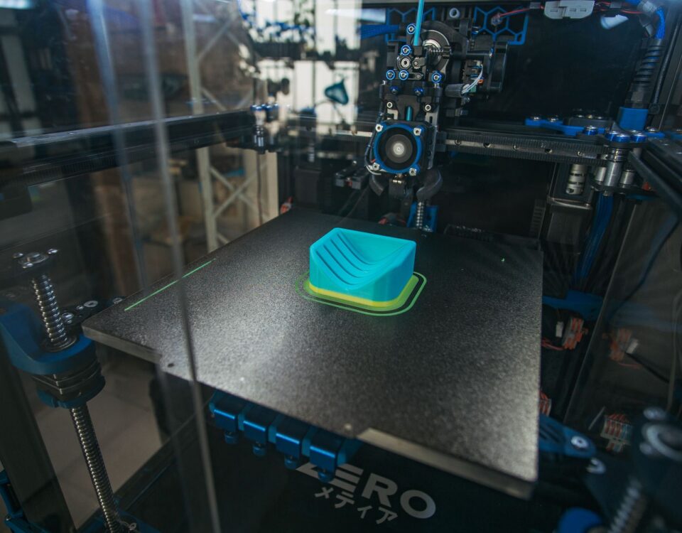 Ruggedized edge computing gateway device mounted in industrial manufacturing facility
